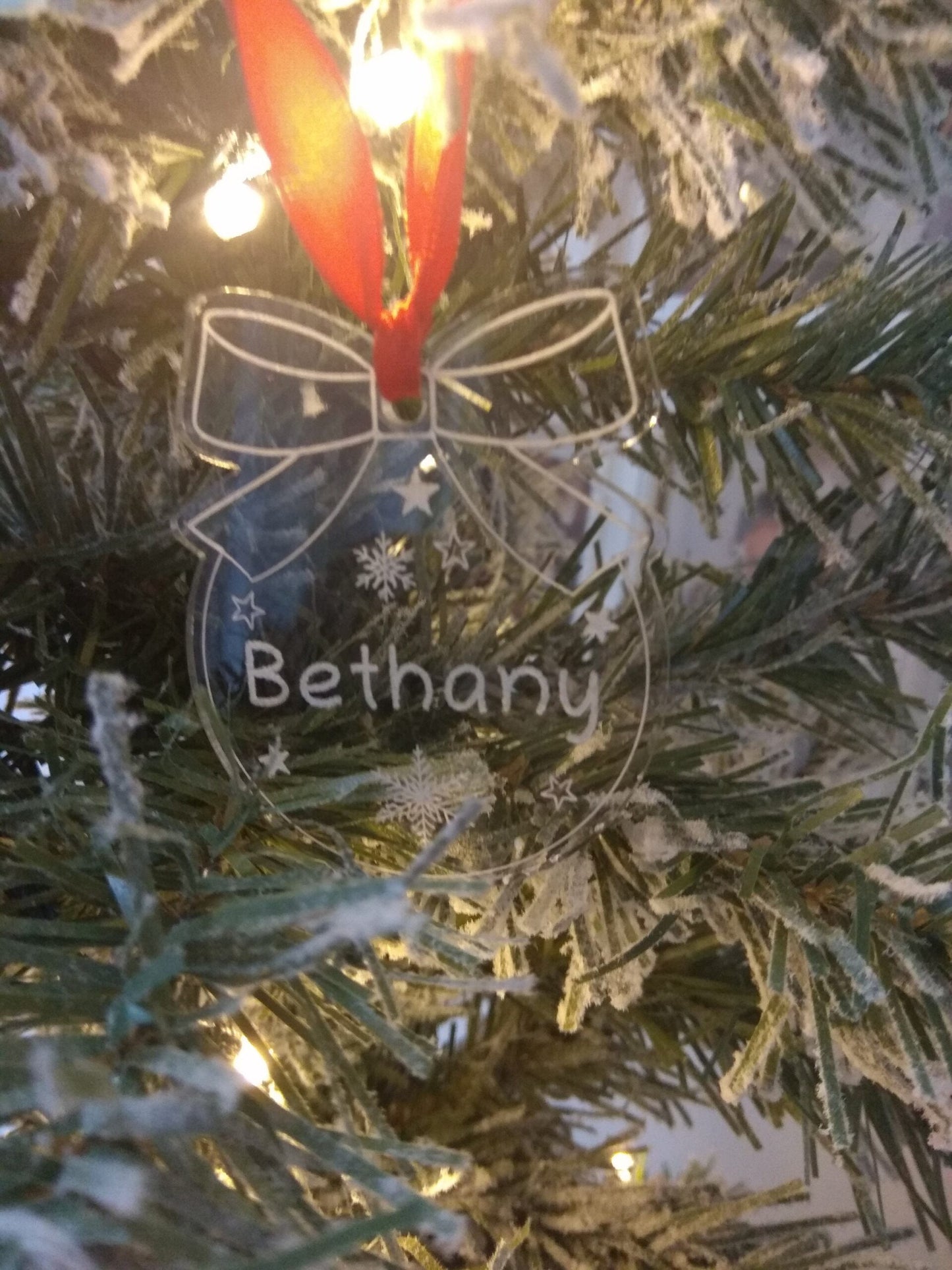 Circle and bow bauble engraved with any name, personalized Christmas tree ornament.