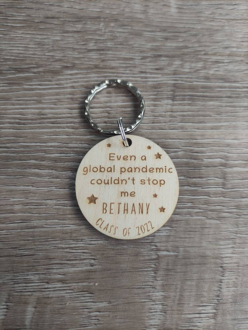 Circle keyring engraved with custom wording, perfect for your class gift.