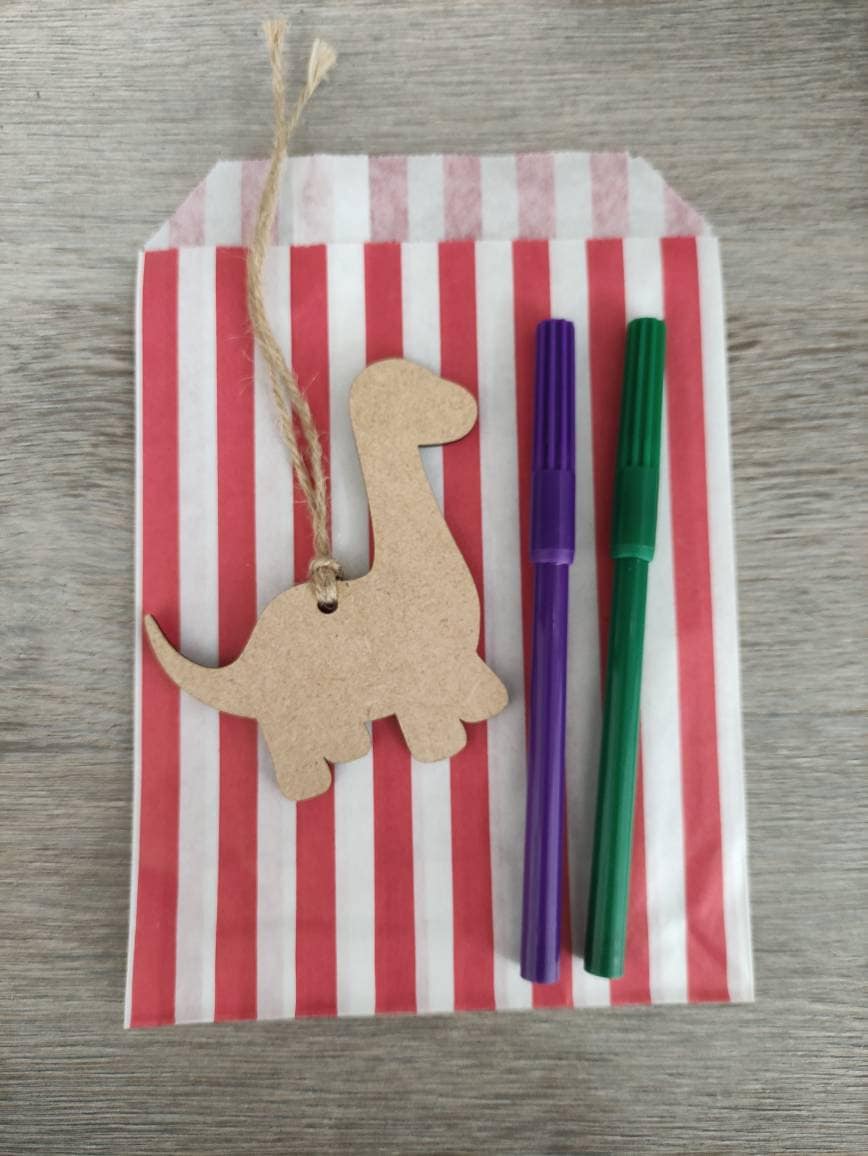 Wooden laser-cut shape with a hole at the top for hanging, string included, and 2 coloured pens inside a paper bag.