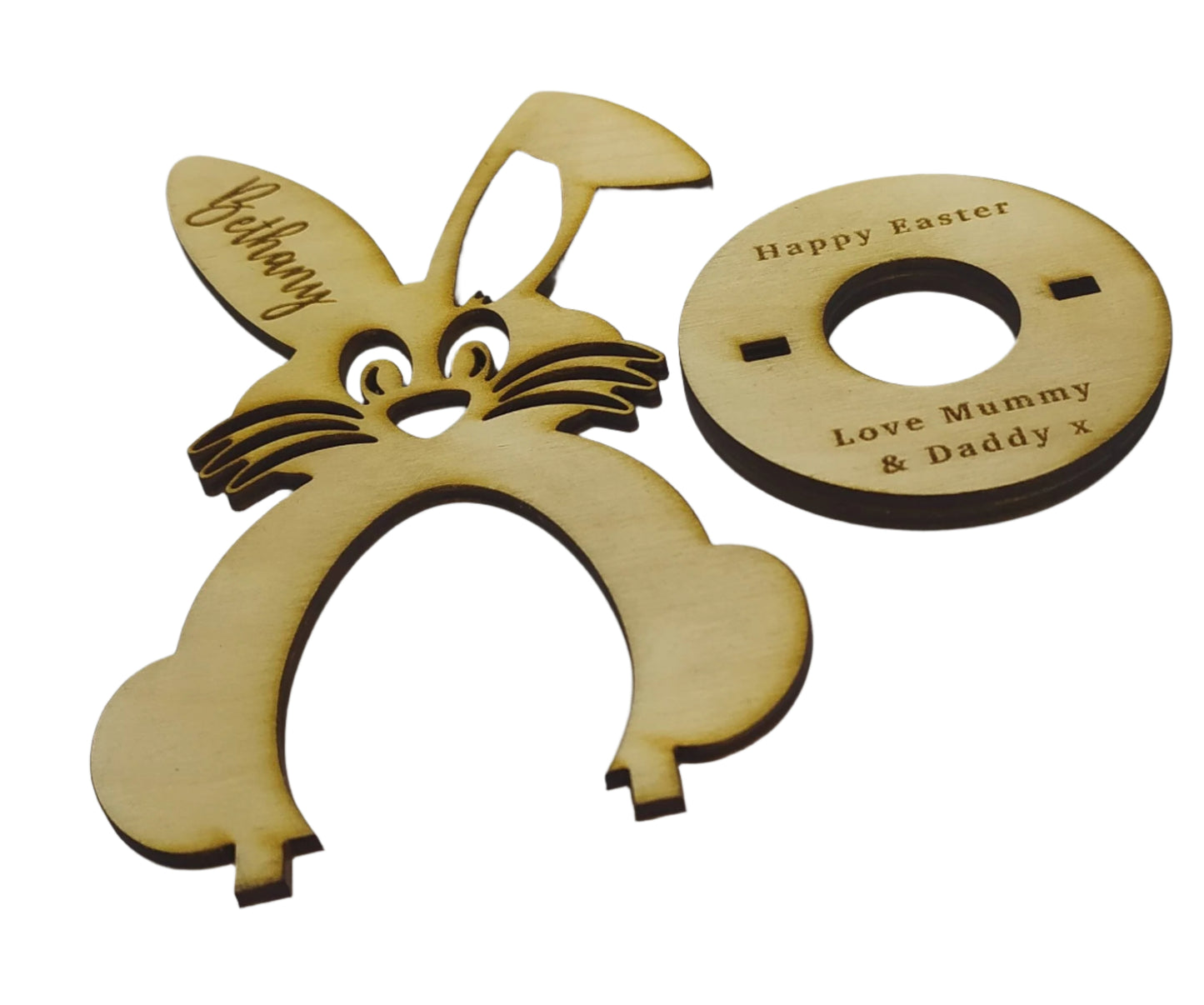 Personalised Bunny Easter Egg Holder, laser engraved with a name on the ear and a message on the base, designed to hold a chocolate egg.