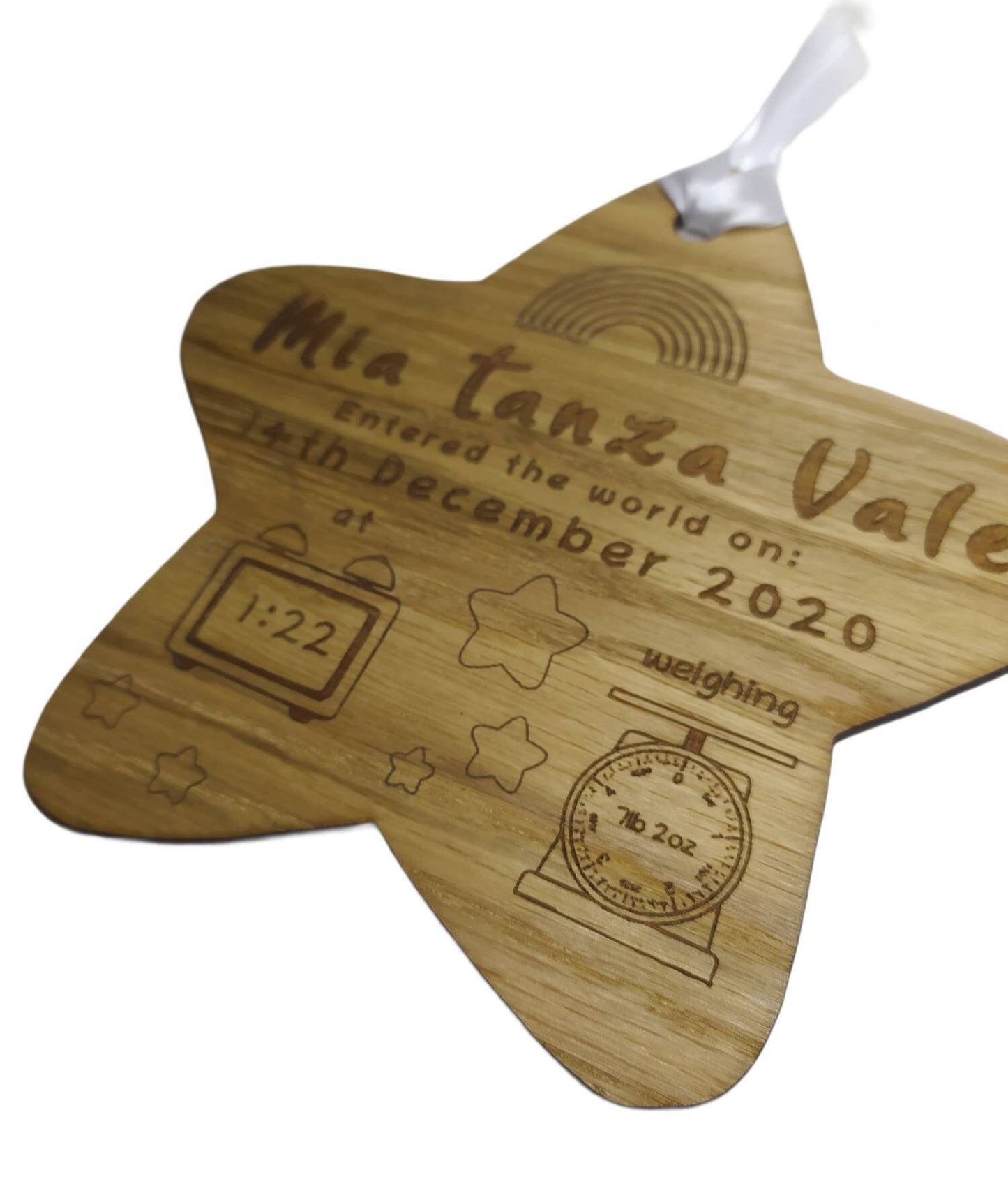 Personalised oak veneer wooden star engraved with a newborn's full name, date of birth, time, and weight. Finished with a white string for hanging, making it a thoughtful keepsake for families.