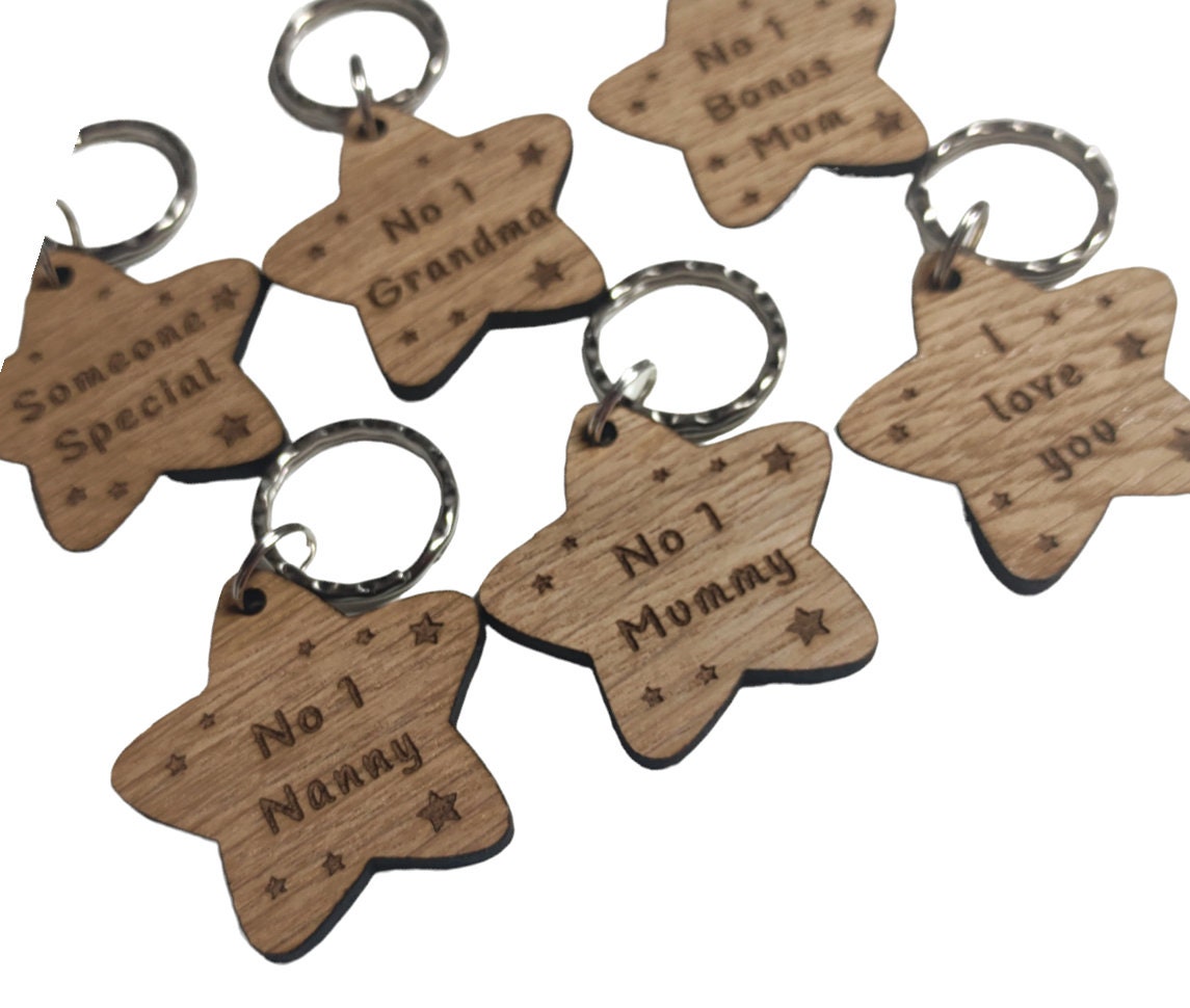 Star-shaped keyrings engraved with custom wording of your choice.