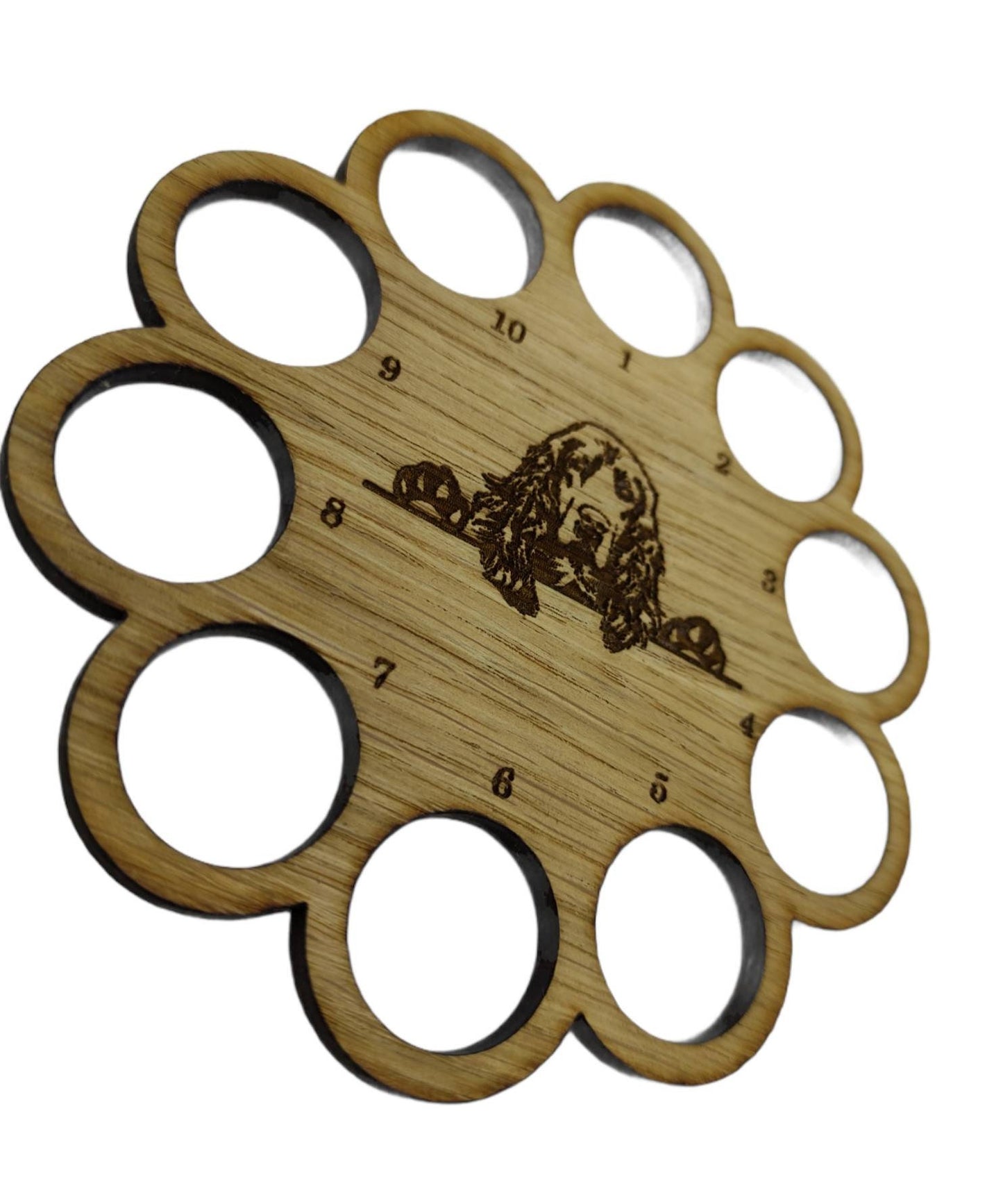 Tapestry organiser with a Spaniel dog engraved in the middle, holds 10 threads.