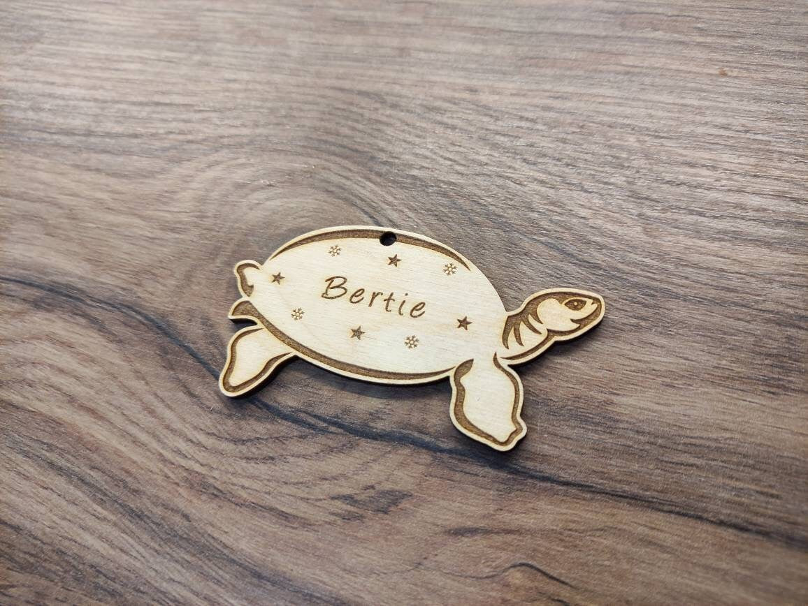 Personalised Christmas Tortoise Bauble with custom engraving, wooden holiday ornament for Christmas tree decoration