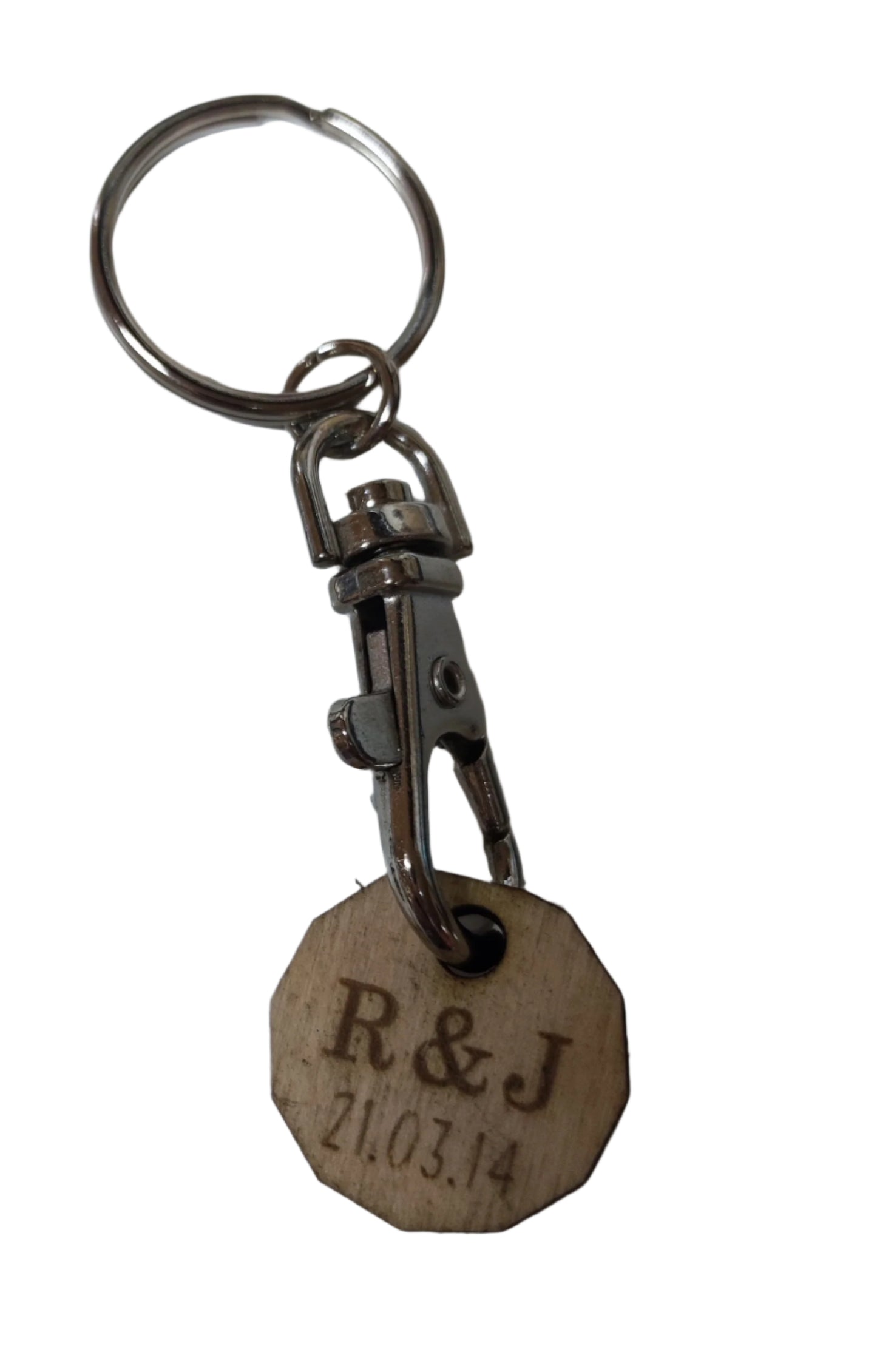 Personalised trolley keyring with a letter initial or Christmas design, same shape and thickness as a £1 coin, attached to a split ring and clip.