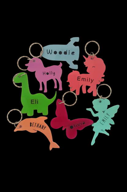 Acrylic Keyrings with any name cut out in the middle. 