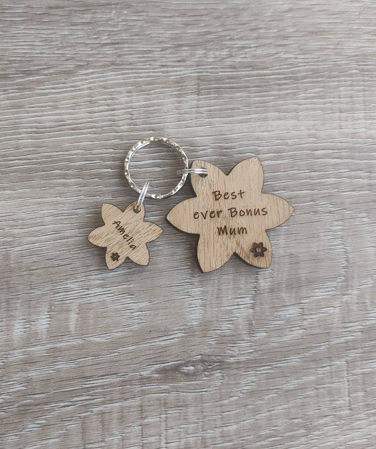 Flower Shape Keyring with Best ever Bonus Mum engraved and smaller charms with child's name. 