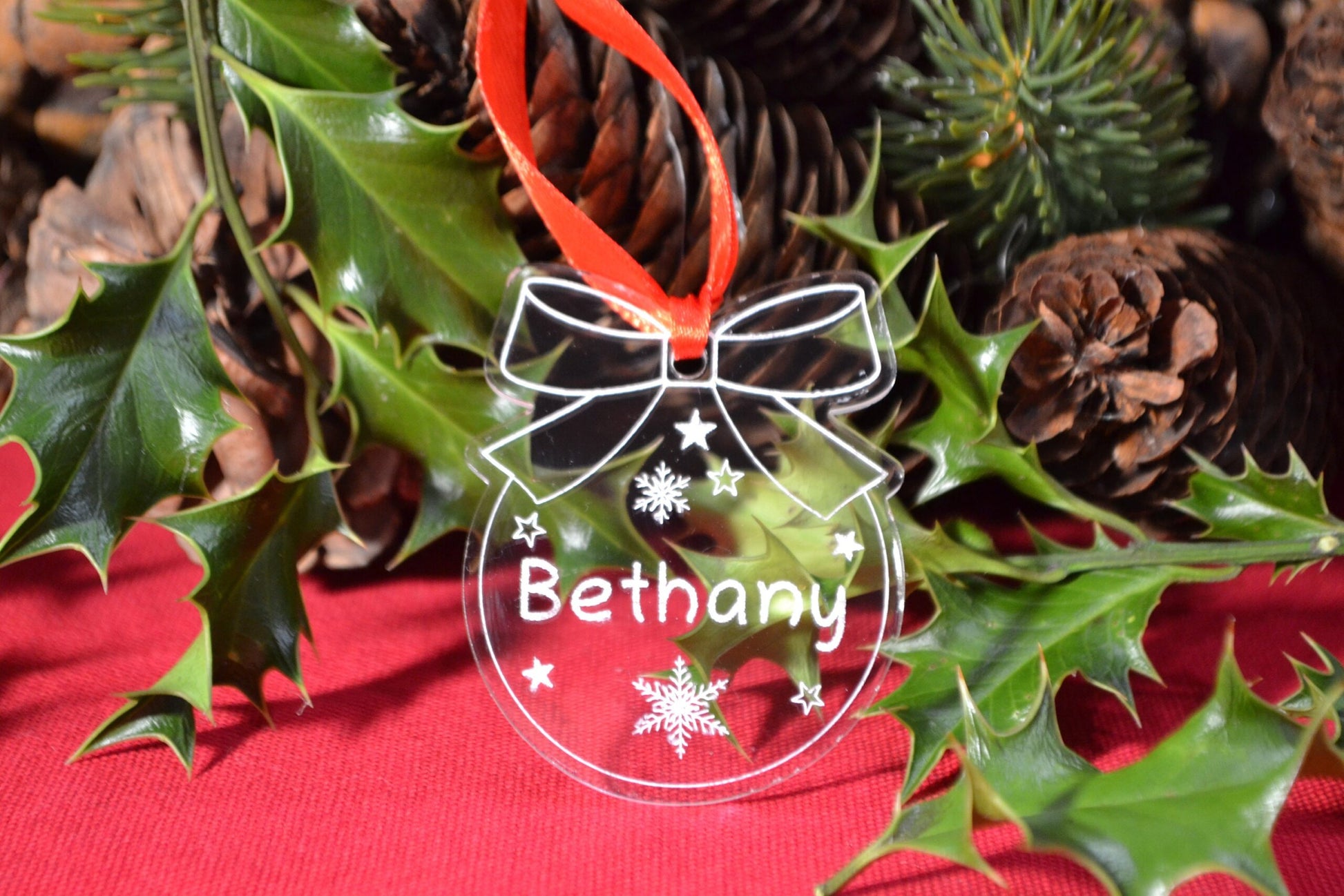 Circle and bow bauble engraved with any name, personalized Christmas tree ornament.