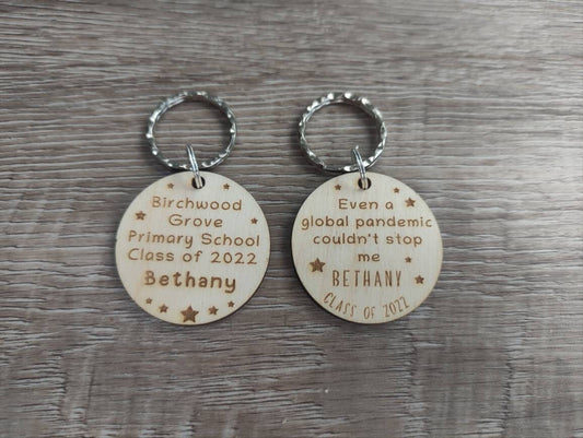 Circle keyring engraved with custom wording, perfect for your class gift.