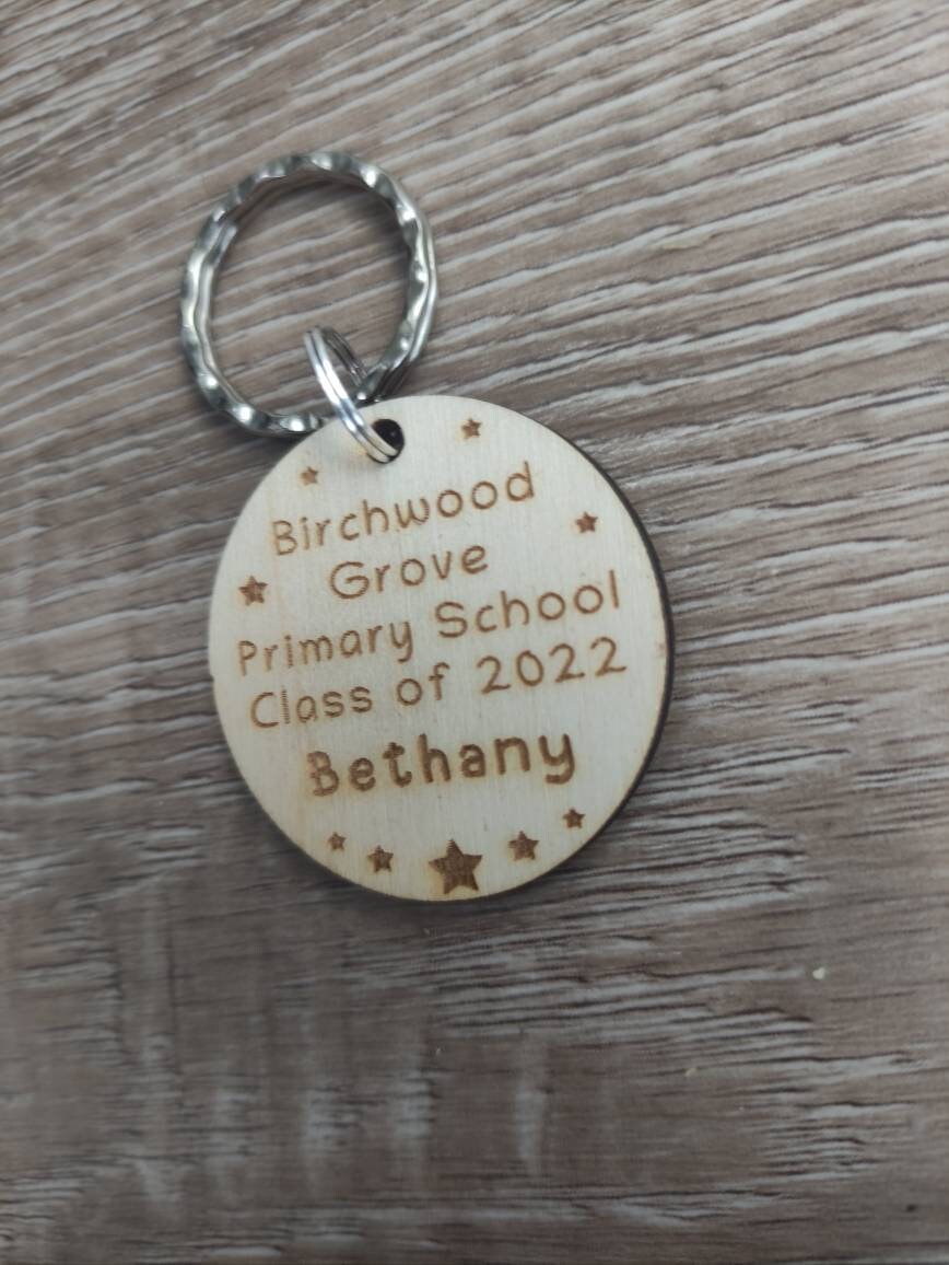 Circle keyring engraved with custom wording, perfect for your class gift.