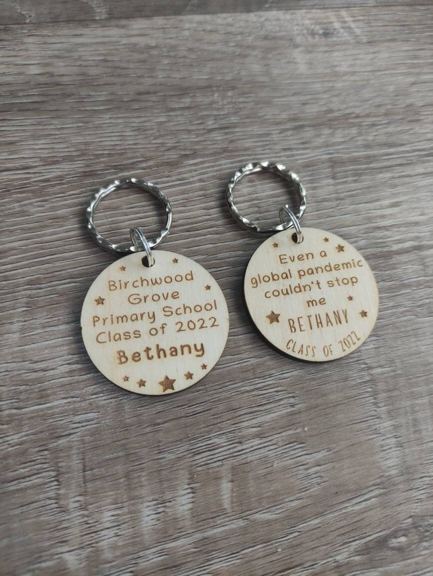 Circle keyring engraved with custom wording, perfect for your class gift.