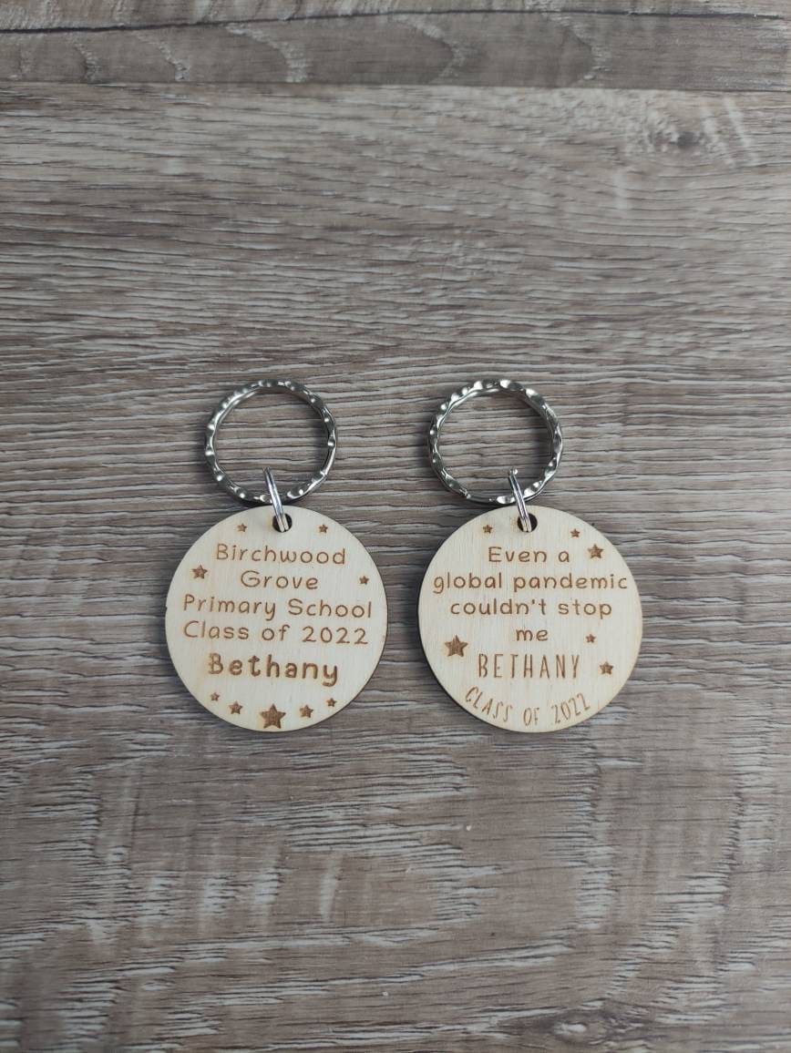 Circle keyring engraved with custom wording, perfect for your class gift.