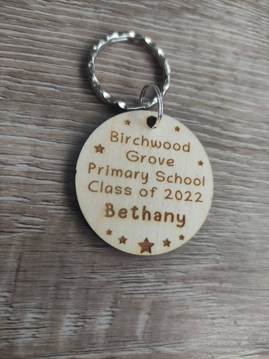 Circle keyring engraved with custom wording, perfect for your class gift.