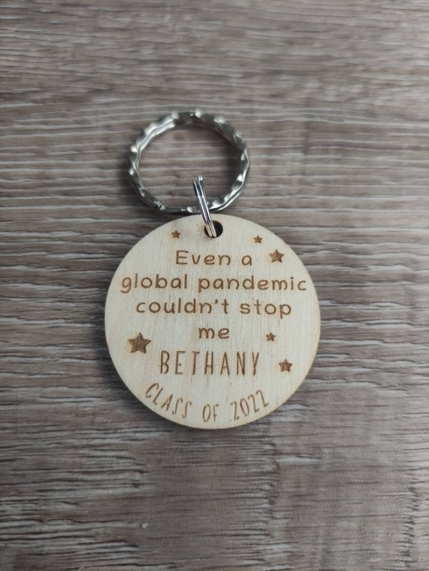 Circle keyring engraved with custom wording, perfect for your class gift.