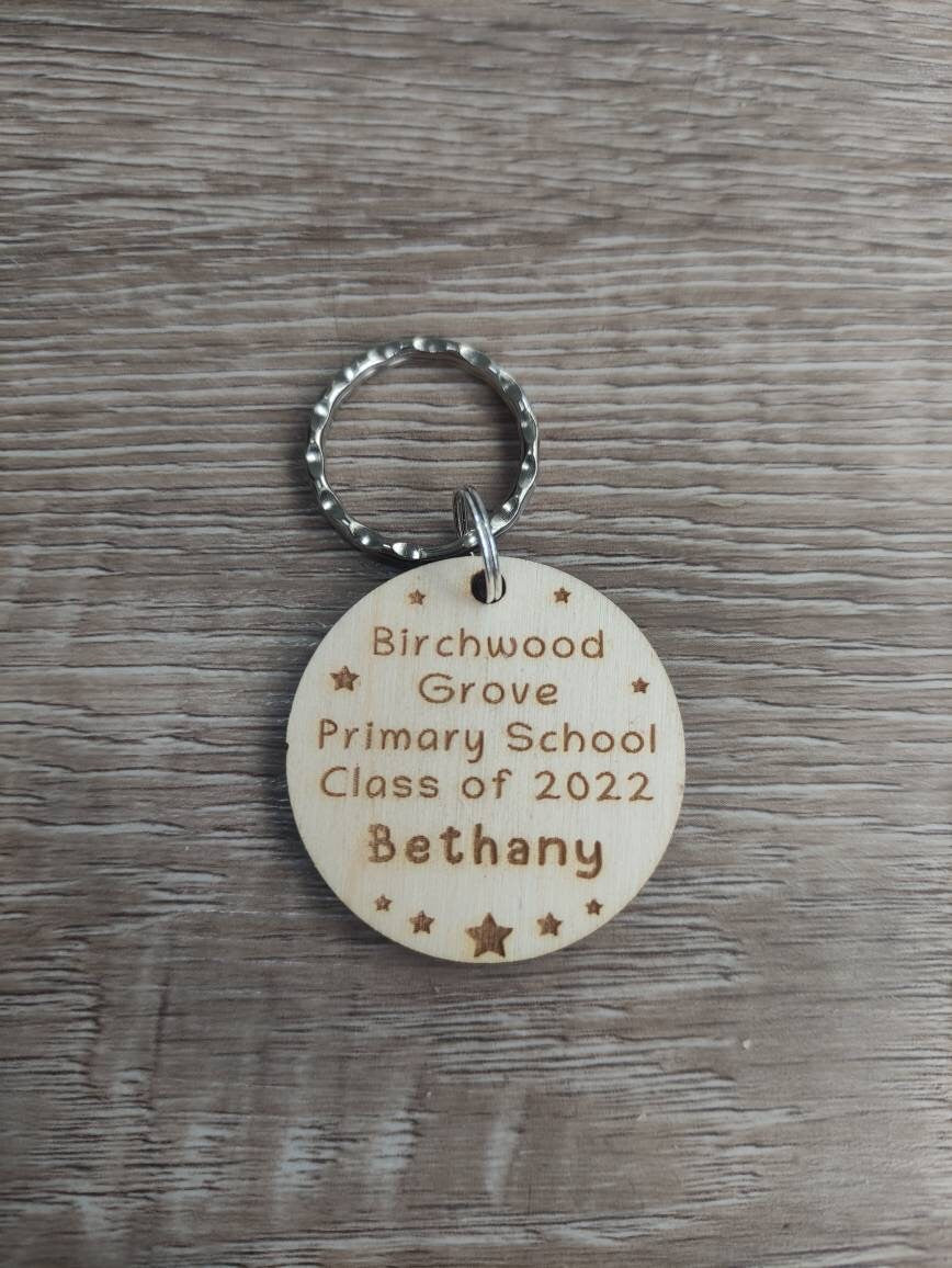 Circle keyring engraved with custom wording, perfect for your class gift.