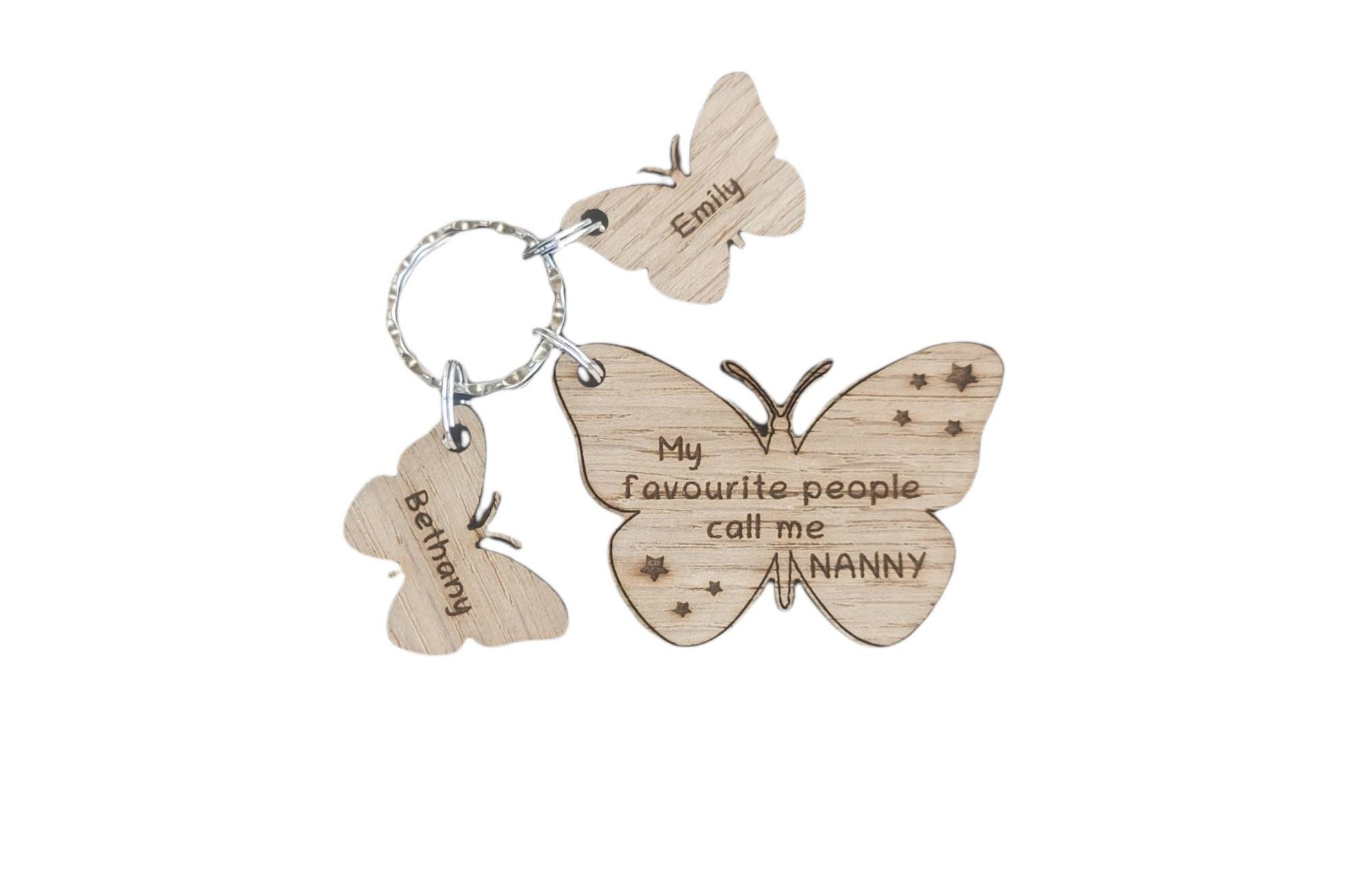 Butterfly design keyring engraved with "My favourite people call me NANNY" and custom butterfly-shaped charms.