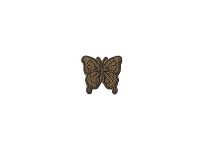 Butterfly shape needle minder on oak veneer wood