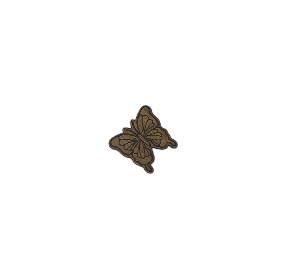 Butterfly shape needle minder on oak veneer wood