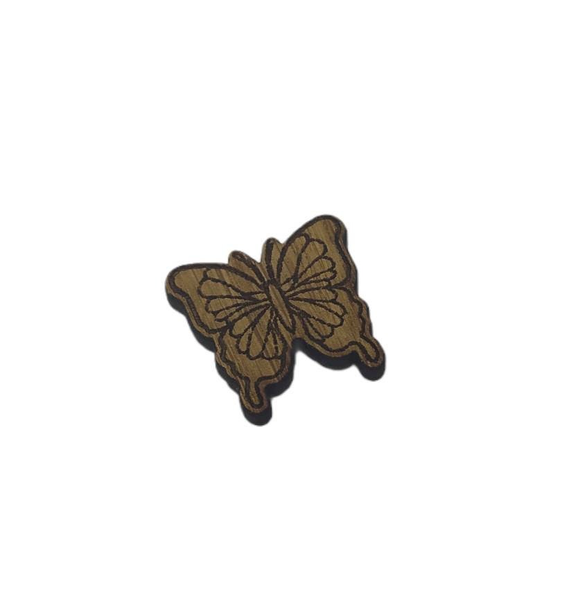 Butterfly shape needle minder on oak veneer wood