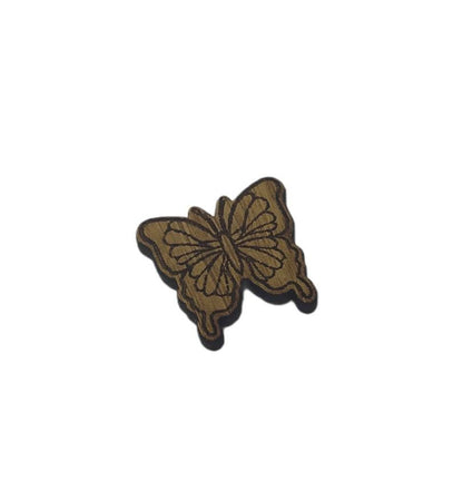 Butterfly shape needle minder on oak veneer wood
