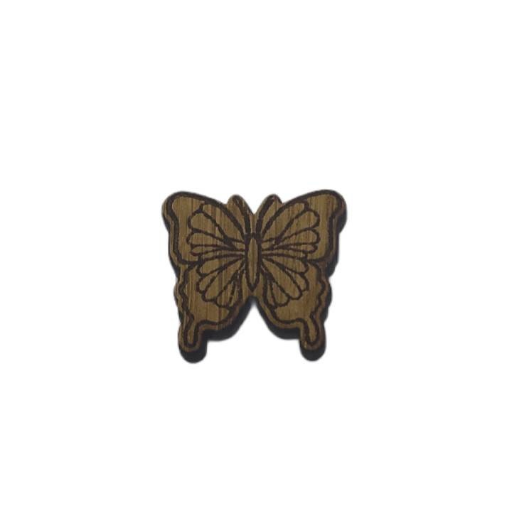 Butterfly shape needle minder on oak veneer wood
