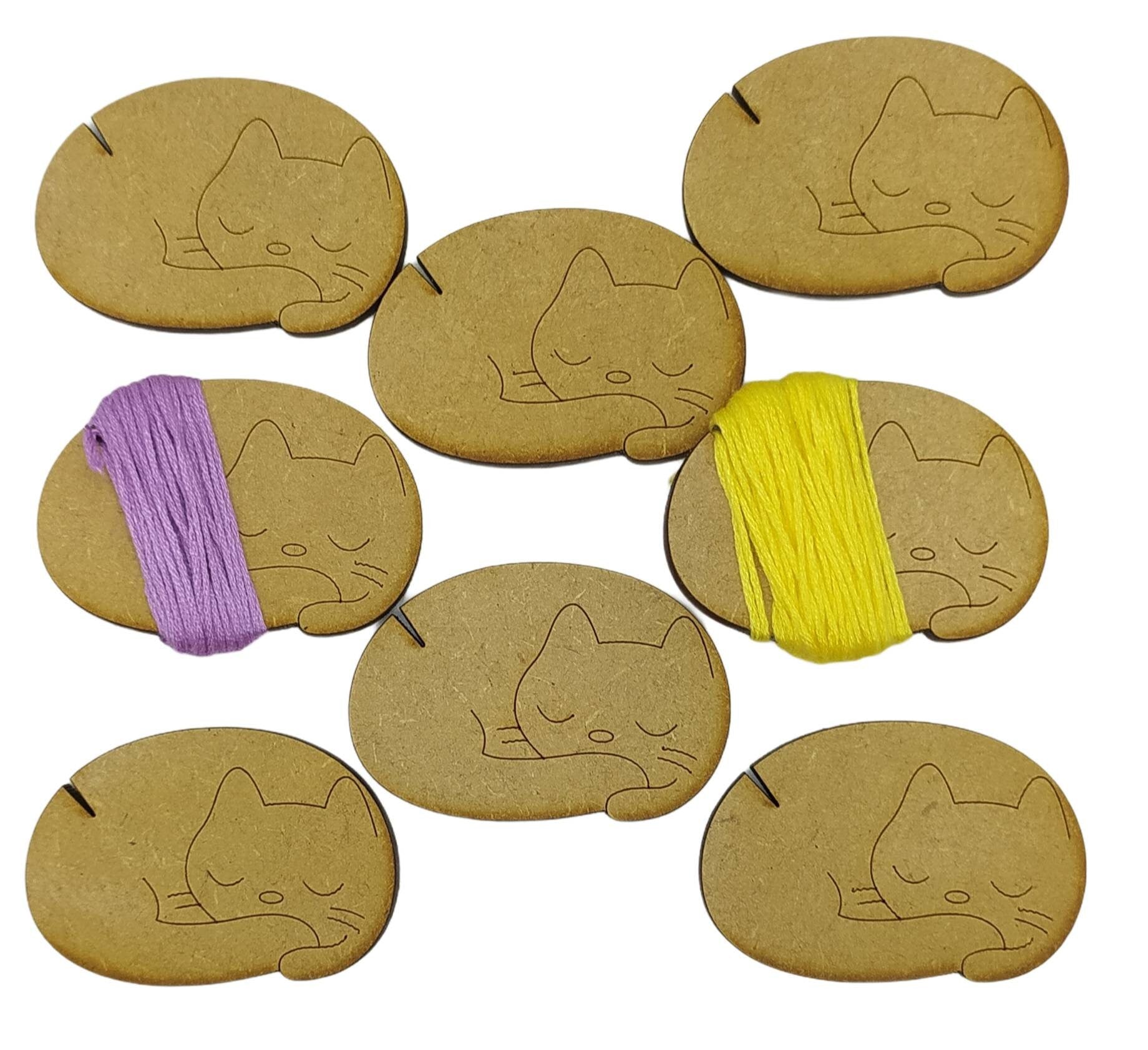 Sleeping Cat Design Bobbin – Wooden Cross Stitch and Embroidery Thread Holder with a small gap on the top left to secure your thread in place. Perfect for organising sewing and craft supplies.