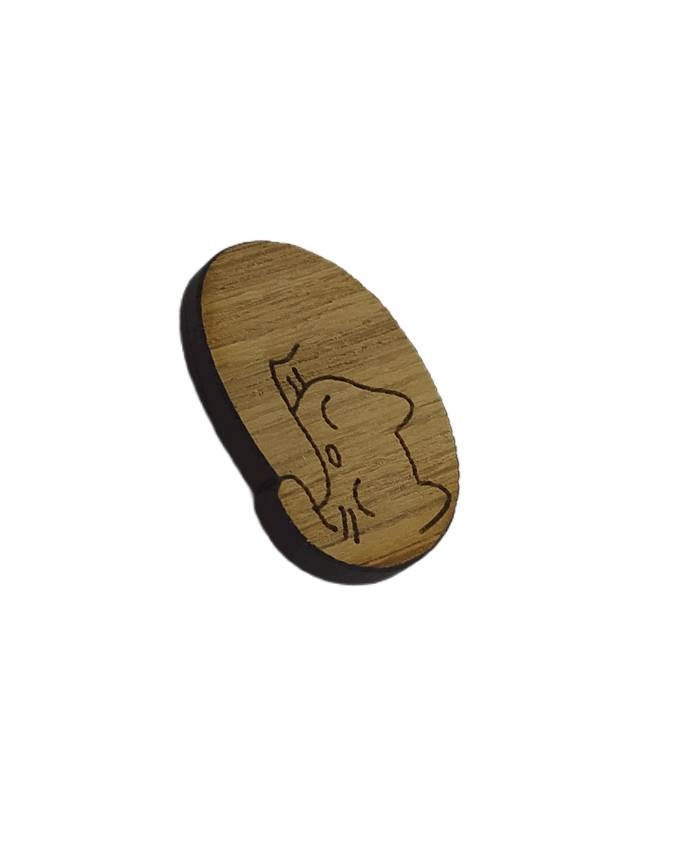 Cat-shaped needle minder with a strong magnet to hold needles, perfect for embroidery and cross-stitch projects.