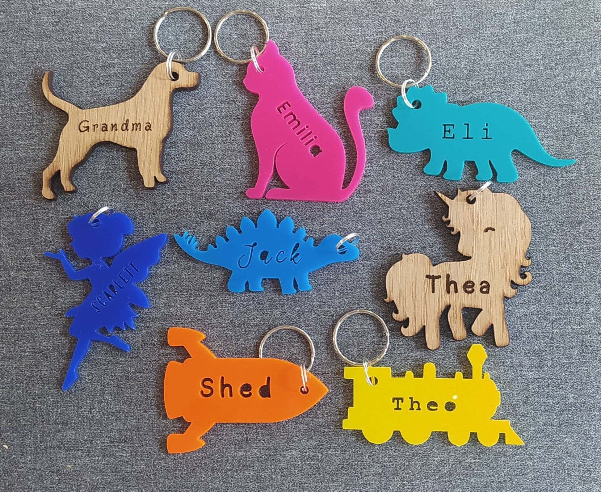 Coloured acrylic keyrings with a name cut out in various fun designs.