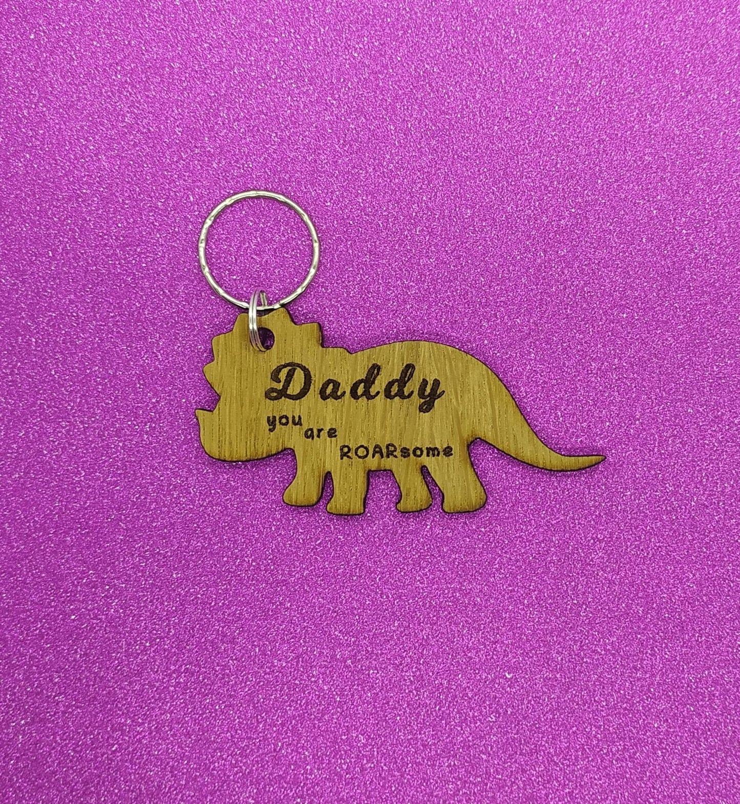 Triceratops keyring, engraved with "Daddy you are ROARsome," perfect for Father's Day or a special gift