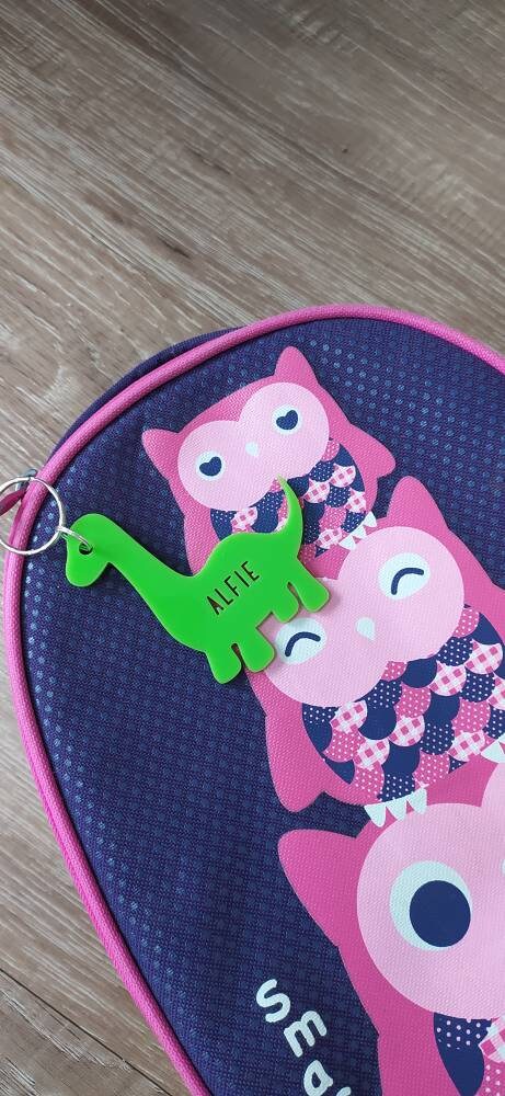 Coloured acrylic keyrings with a name cut out in various fun designs.