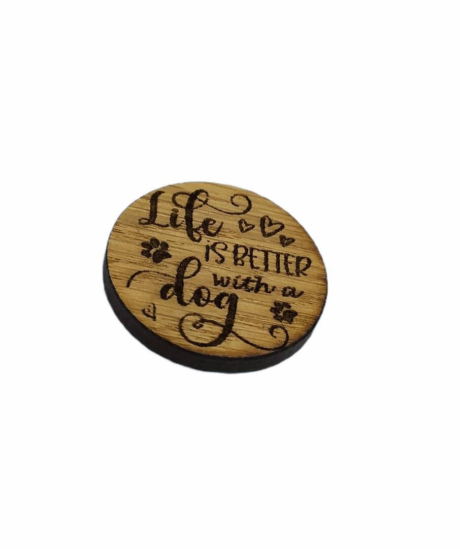 Round needle minder engraved with 'Life is Better with a Dog'