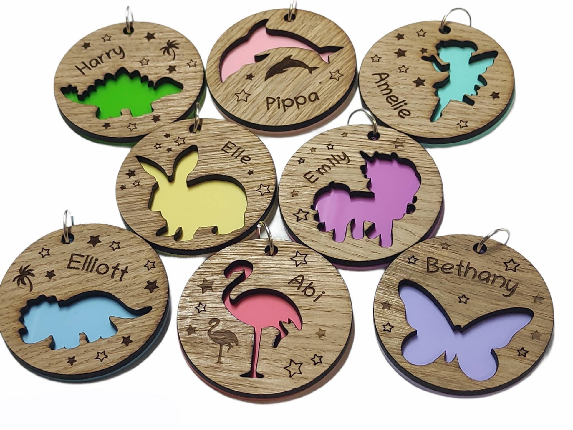 Round wooden keyring with colourful acrylic backing and a laser-cut Flamingo design – personalised with engraved child’s name, perfect for school bags.