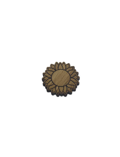 Flower-shaped needle minder with a decorative design, perfect for keeping your needles organised.