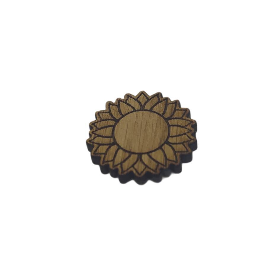 Flower-shaped needle minder with a decorative design, perfect for keeping your needles organised.