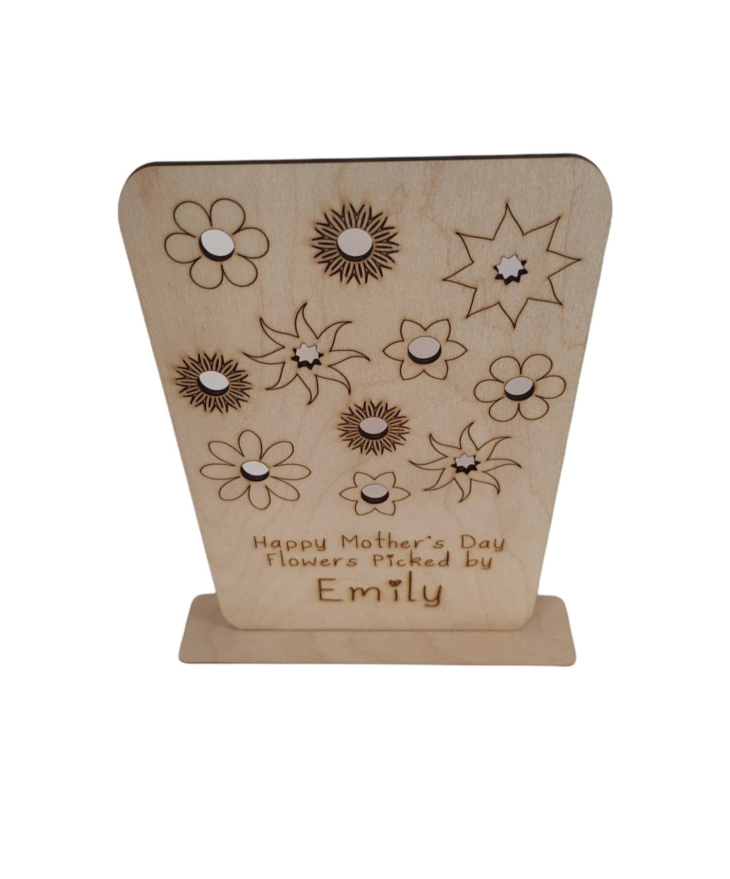 Personalised wooden floral decoration, intricately laser-engraved with flower designs and featuring holes to add your own blooms. 