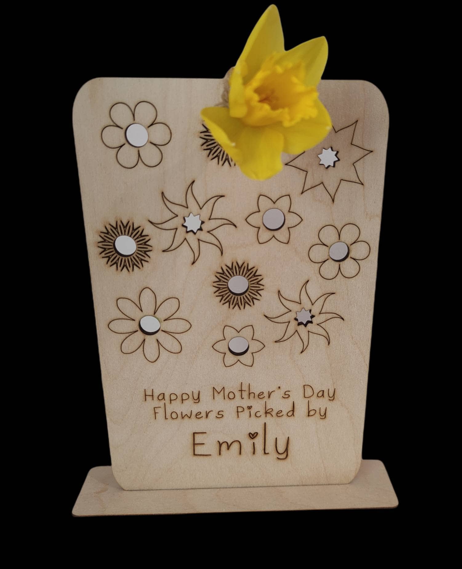 Personalised wooden floral decoration, intricately laser-engraved with flower designs and featuring holes to add your own blooms. 