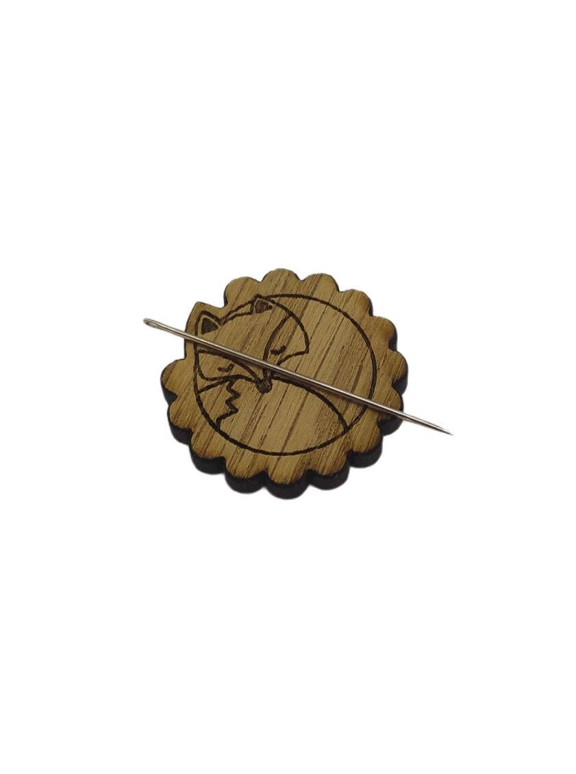 Fox Needle Minder with a strong magnet, designed to keep your needles organized while working on embroidery or cross stitch projects.