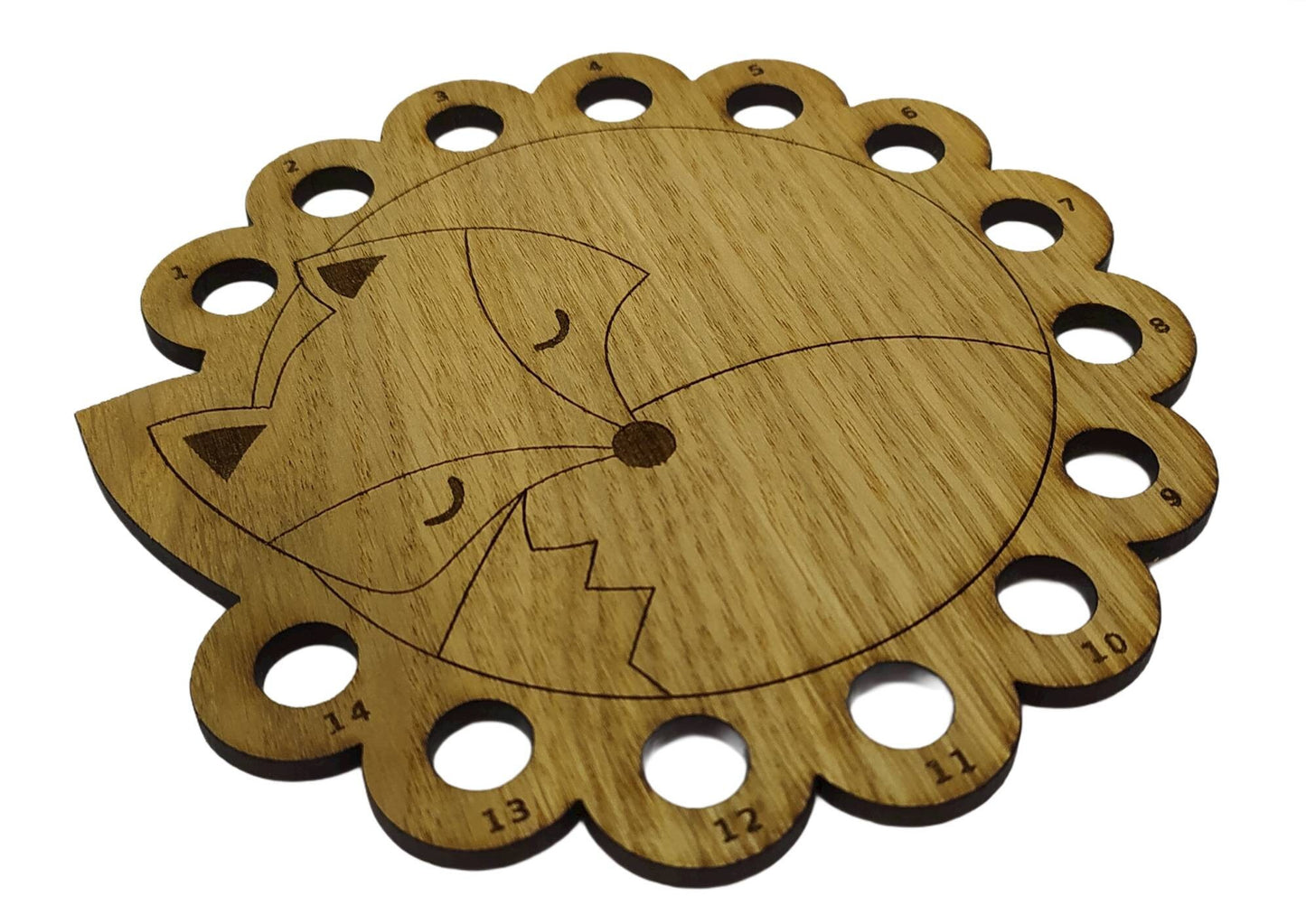 Curled up fox thread holder with 14 holes for thread