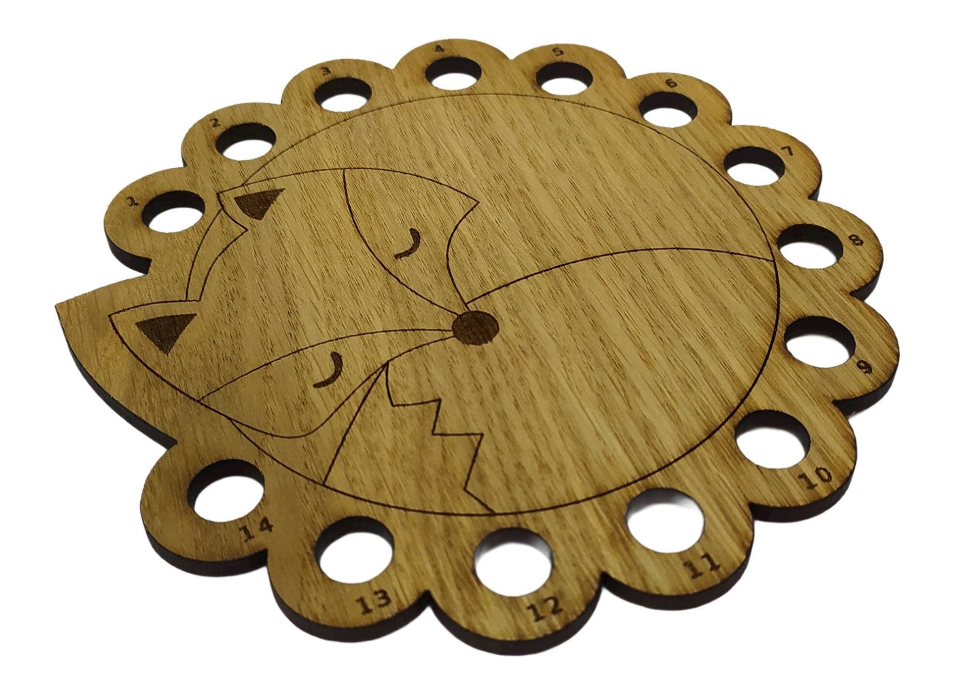 Curled up fox thread holder with 14 holes for thread