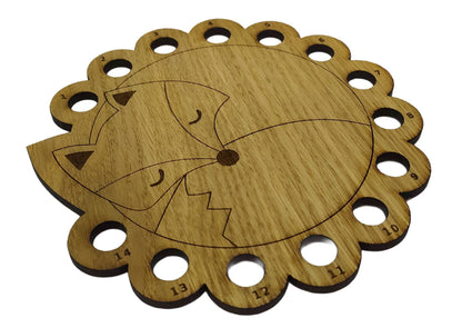 Curled up fox thread holder with 14 holes for thread