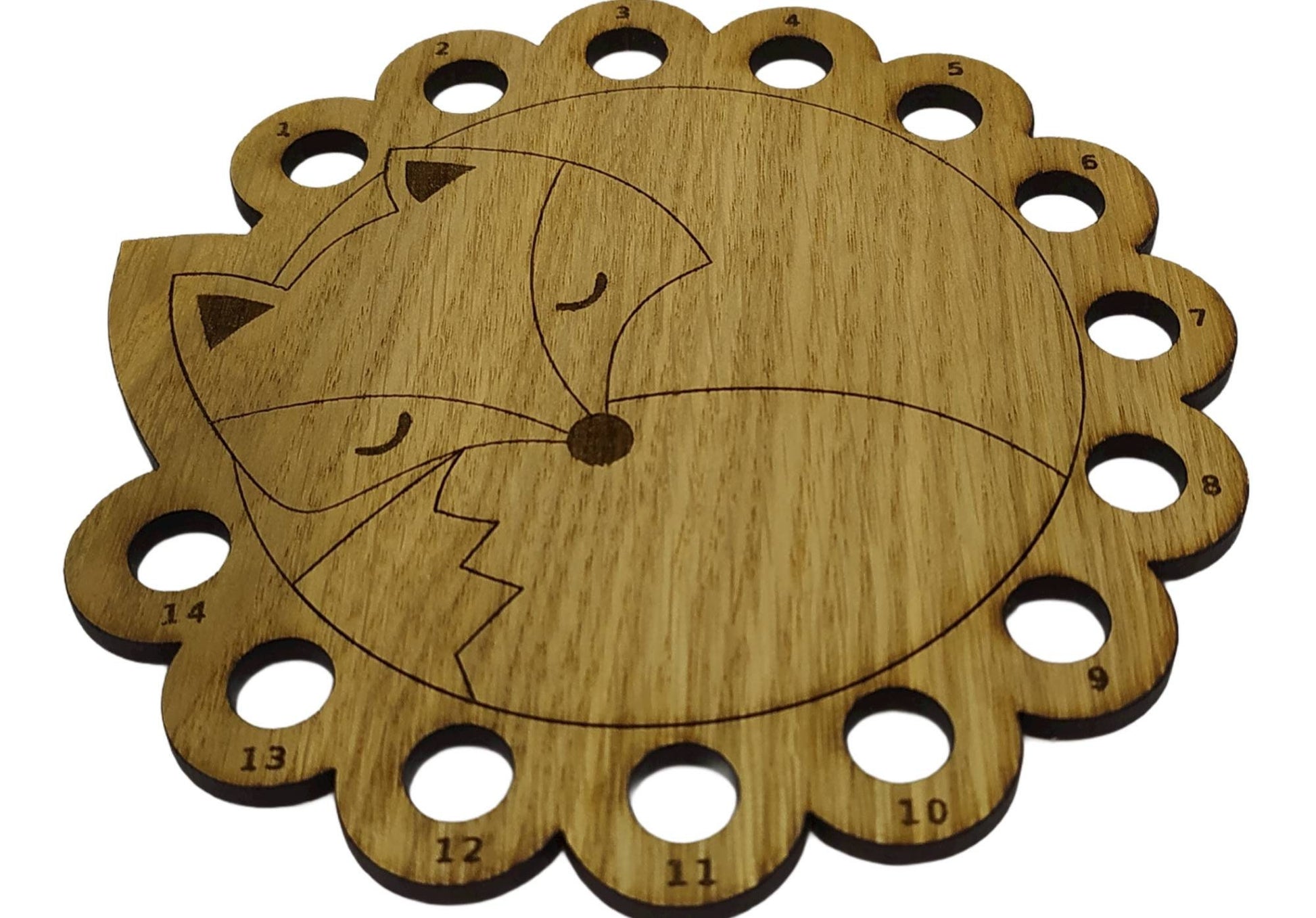 Curled up fox thread holder with 14 holes for thread