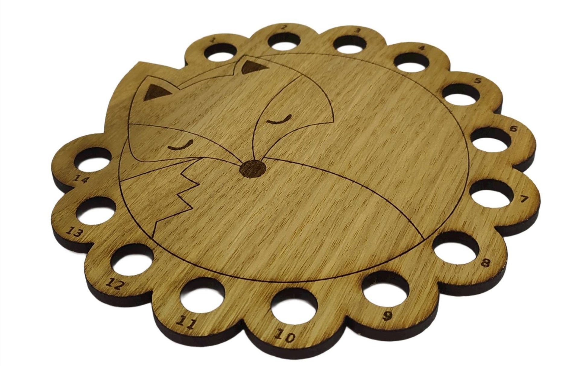 Curled up fox thread holder with 14 holes for thread