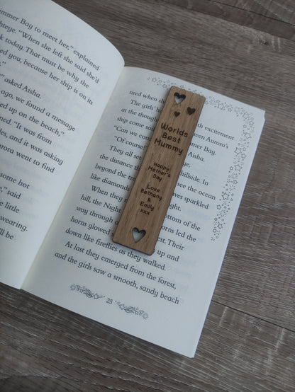 Wooden bookmark featuring cut-out heart shapes and custom engraving, personalised with any wording.