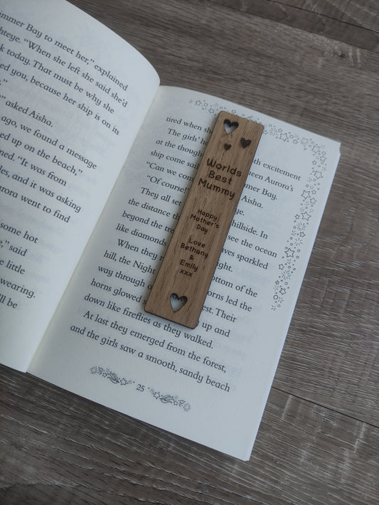Wooden bookmark featuring cut-out heart shapes and custom engraving, personalised with any wording.