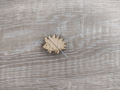 Hedgehog Needle Minder, keeps your needle secure on the front.