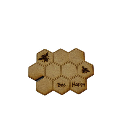 Honeycomb-shaped bobbin for keeping your thread tidy, engraved with bees and 'Bee Happy' design.