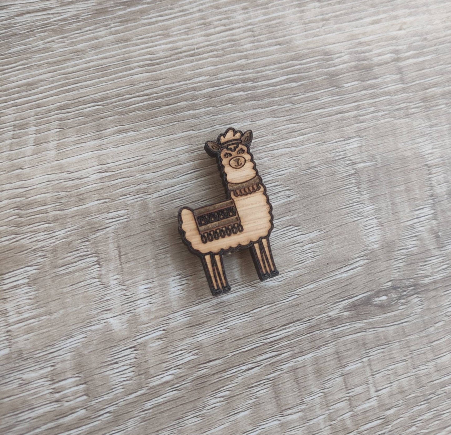 Llama needle minder with a strong magnet, designed to keep your needles organised and prevent them from getting lost.