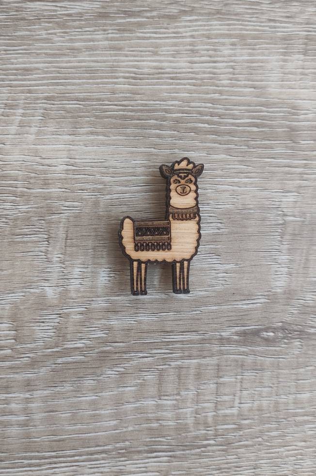 Llama needle minder with a strong magnet, designed to keep your needles organised and prevent them from getting lost.