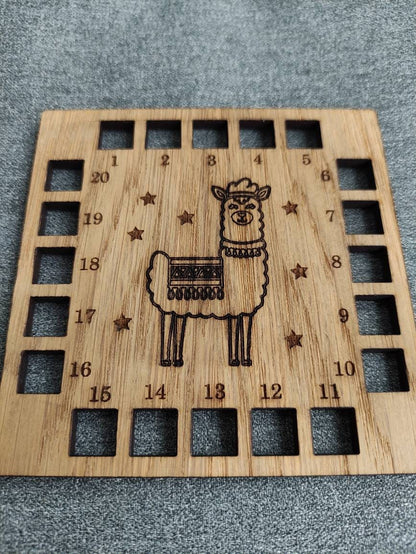 Square shape thread holder, with Llama and stars engraved in the middle. 20 holes for thread.
