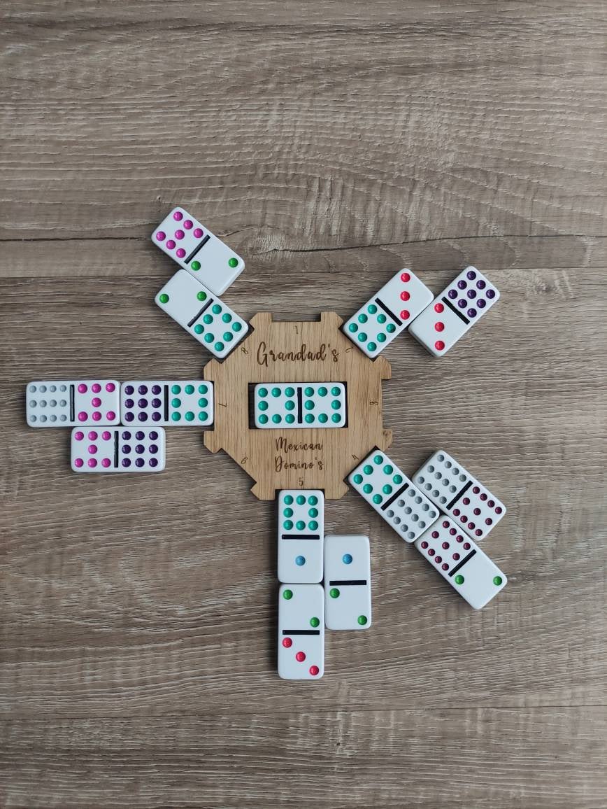 Personalised wooden hub for use with the Mexican Dominos game, custom engraved with any name. This beautifully crafted hub adds a unique, personal touch to your game setup.